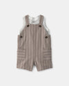 Two-piece linen set with striped short overalls and brown tank top