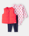 Three-piece set: padded vest, bodysuit, and red leggings