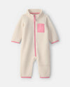 Macacão de micropolar com fecho, bicolor creme e rosa