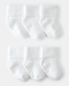 Pack de 6 botinhas de bebé em tecido atoalhado branco