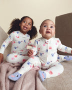 Pijama de terciopelo con pie, monstruos color crema - Carter's