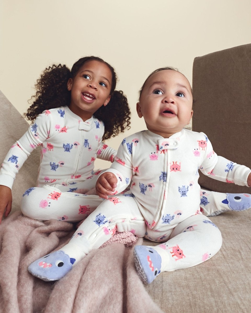 Pijama de terciopelo con pie, monstruos color crema - Carter's